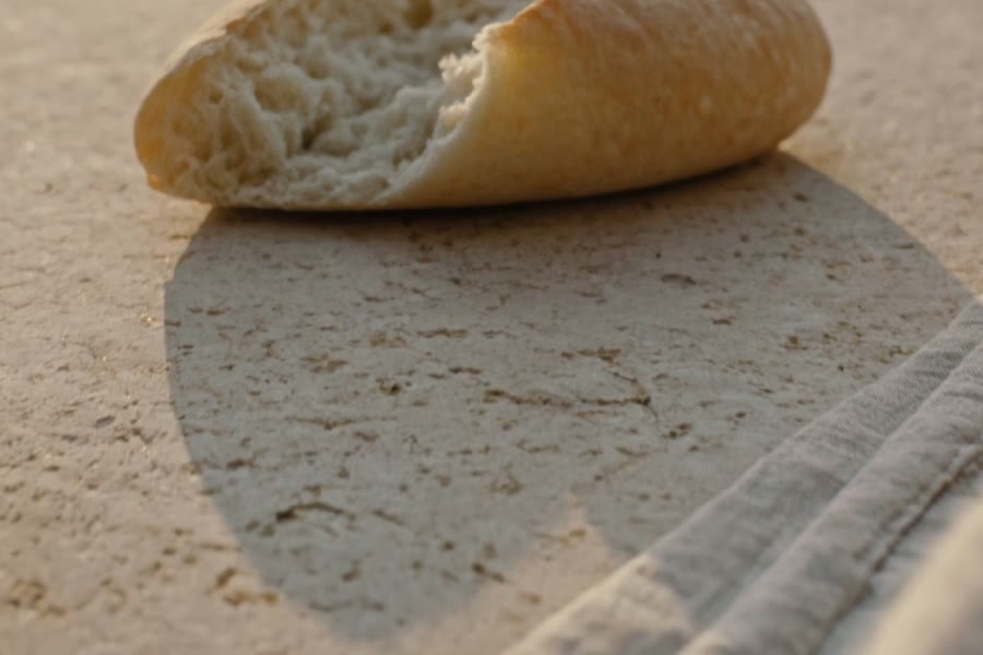 Fresh bread on warm stone